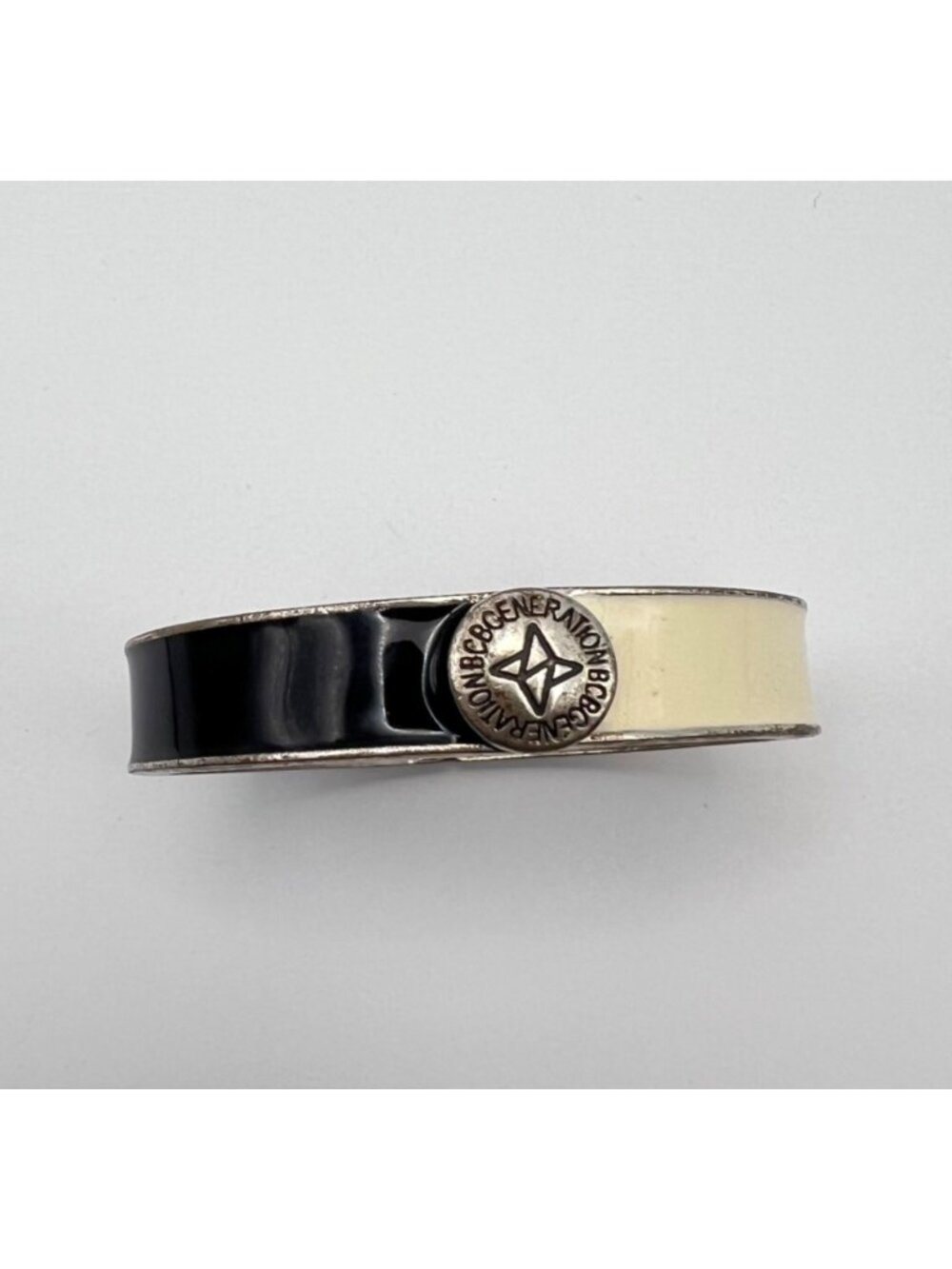 BCBGeneration Black Cream Enamel Hinged Bangle Bracelet 6.5" Silver Tone Signed